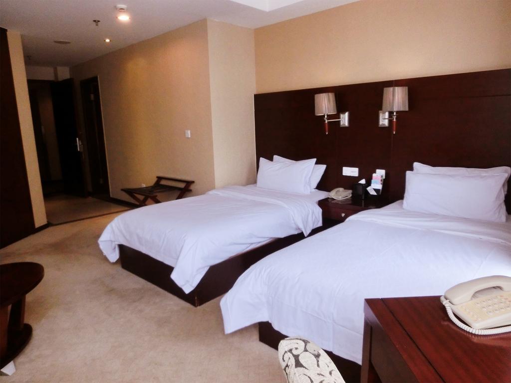 Ramada Shanghai Wujiaochang Rum bild